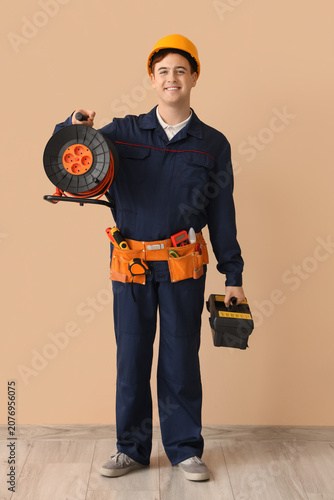 Male electrician with exten...