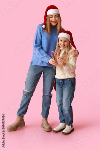 Cute little girl and her mo...