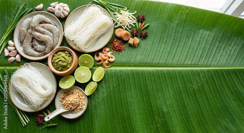 Pad Thai ingredients on green banana leaf