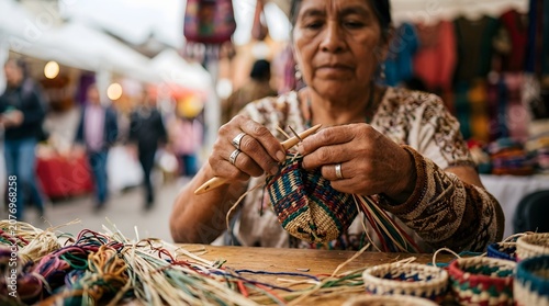 Elderly woman focused on crafting intricate woven items with colorful threads