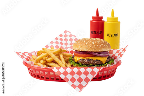 Photos Hamburger and french fries in a red basket with condiments