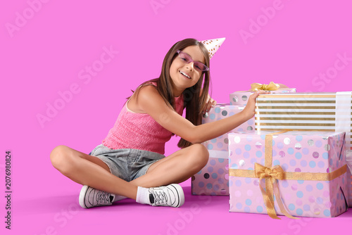 Happy little girl with Birt...
