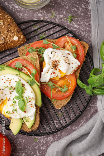 Grid of tasty sandwiches wi...