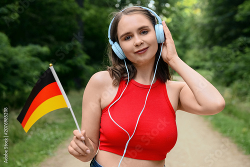 Young woman with headphones...
