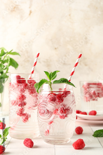 Glasses of fresh raspberry ...