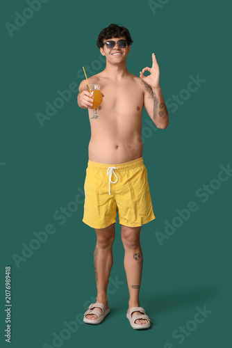 Young man with summer cockt...