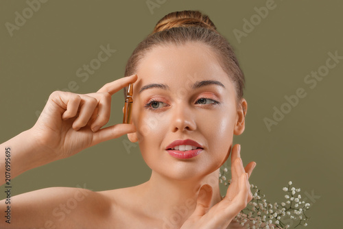 Beautiful young woman with ...