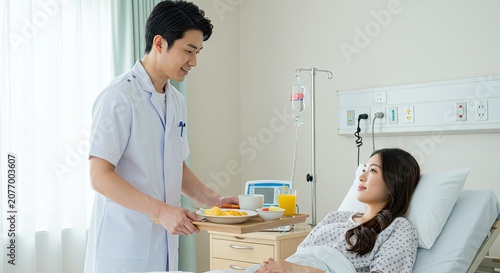 Medical professional serving breakfast to a patient in a hospital room setting