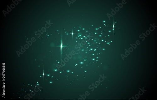 Fotografía 深みのあるエメラルドグリーンの幻想的な背景に無数の光粒子ときらめく星の軌跡が流れる高級感あふれる抽象イルミネーションエフェクトデザイン素材
