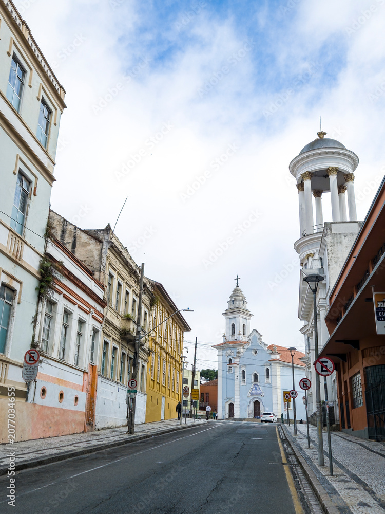 Obraz premium Atmospheric look of Curitiba historic center with colonial architecture under a grey cloudy sky, Parana.