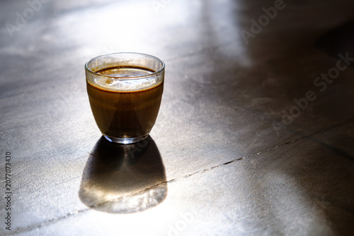 Photos Minimalist Espresso Shot with Soft Sunlight