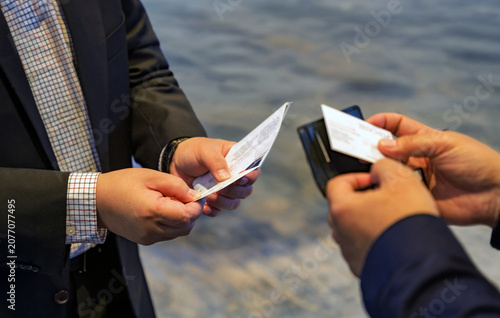 Businessmen Exchanging Cards