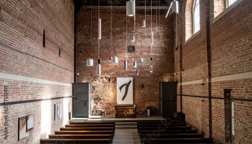Interior view of a modern minimalist brick church hall.