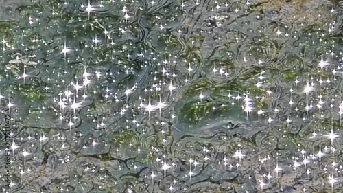 
Abstract Ancient Carving-Like Water Ripples with Intense Midday Sun Sparkles Texture .4k

