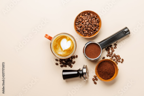 Photography Espresso coffee setup with beans tamper and portafilter top view