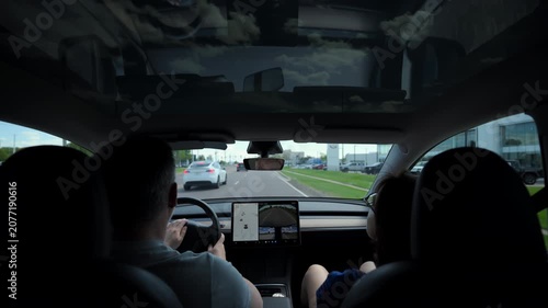 Wide POV inside vehicle during drive.