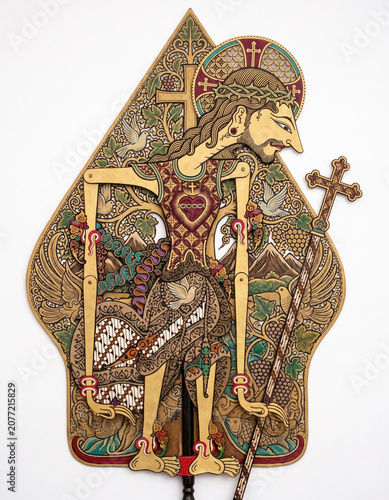 Jesus Christ with Crown of Thorns in Traditional Javanese Wayang Kulit Shadow Puppet Style Isolated on White Background