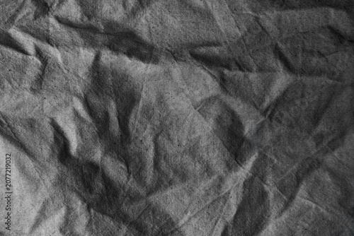 Quadro su tela Light black or silver grey tone colour paint on creased cotton cloth texture bac