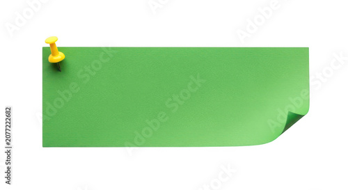 Green sticky note with yellow pin icon on top