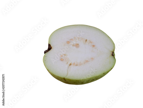 Half cut green guava showing pulp and seeds isolated on white background