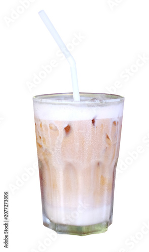 Fresh a clear glass of iced latte coffee with milk foam