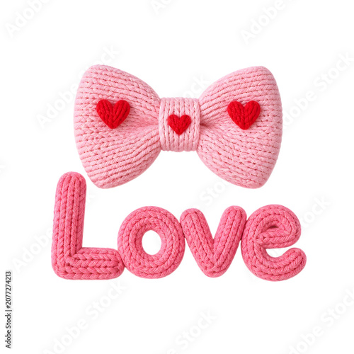 Pink knitted bow with hearts and love text on black background for Valentine's