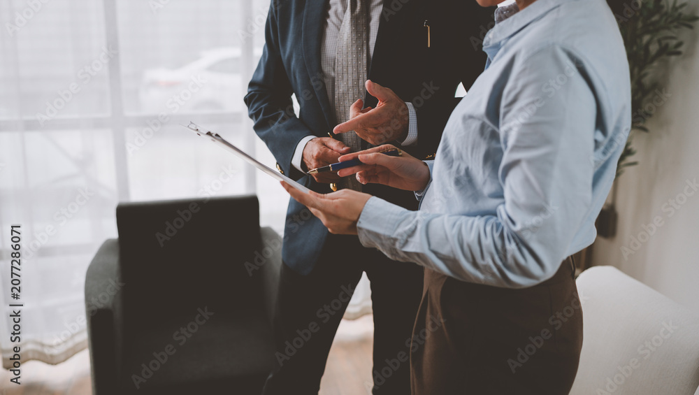 Fototapeta premium Business professionals discussing loan application details with client
