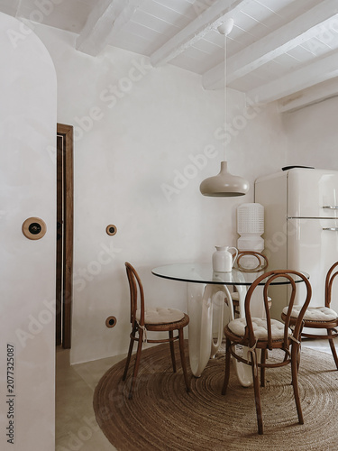 Neutral Tones and Natural Elements. Mediterranean Dining Space with Rustic Elegance and Minimalist Style