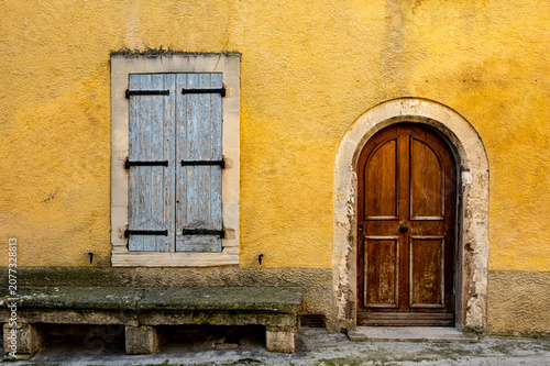 Arch, architecture, bench, blue, blue shutters, building, building exterior, closed door, closed shutters, colourful architecture, door, doors, entrance, Europe, exterior wall, facade, france, French,