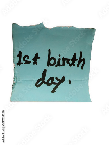 Konstfotografi Handwritten text on torn paper declares happy first birthday celebration transpa
