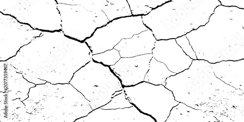 Valokuva grunge High-Contrast Cracked Dry Earth Texture Background Showing Drought Fissures and Arid Soil Pattern