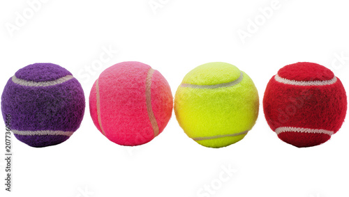 Fotografía Four colorful tennis balls purple pink yellow, red