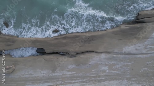 Sea landscape and seaside aerial drone view on coastal ocean scenic rock cliff headland in Iran Qatar Persian Gulf nature reserve marine aquatic tourism accommodation wonderful surfing sailing waves