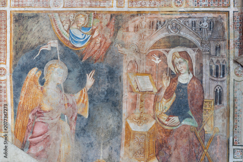 BERGAMO, ITALY - MARCH 21, 2026:  The medieval fresco of Annunciation in the ...