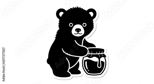 Black bear cub with honey.