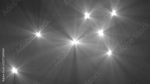 Paparazzi flashes of cameras on a black background. Camera flashes light animation overlay. Bright Lens Flares and Light Rays on a Dark Textured Background