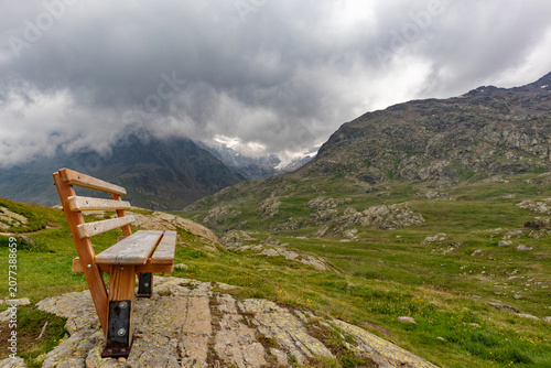 Wood bench in the alps of Valtellina