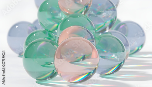 cluster of transparent pastel spheres with prism reflections on white surface