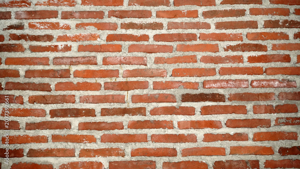 Fototapeta premium Classic red brick wall with white mortar joints.