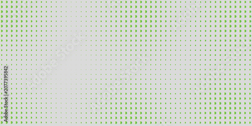 Abstract Green Halftone Dot Pattern Background on Light Gray