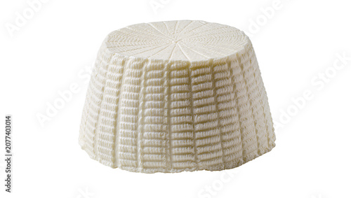 Bild auf Leinwand Fresh ricotta cheese wheel with textured surface