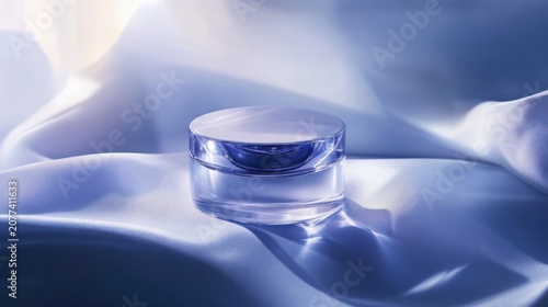 Luxury skincare cream jar on blue silk fabric elegant product shot
