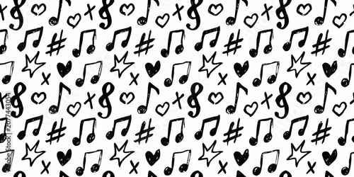 Photos Musical notes and symbols seamless pattern on a white background