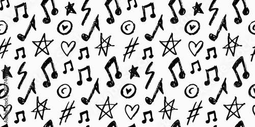 Photos Musical notes and symbols seamless pattern on a white background