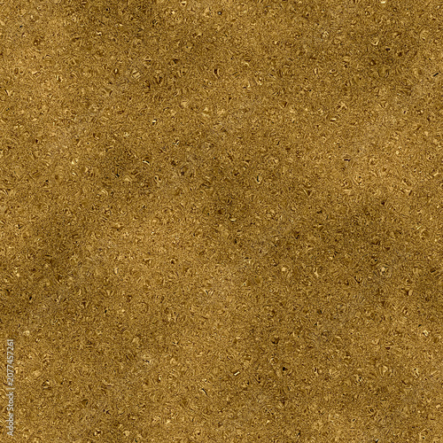 Close-up textured background of golden sand with subtle sparkle