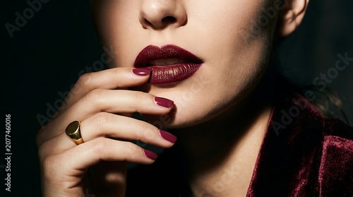 Elegant Woman with Dark Red Lips & Manicured Nails. Luxury Beauty & Fashion Portrait for Cosmetic Advertising