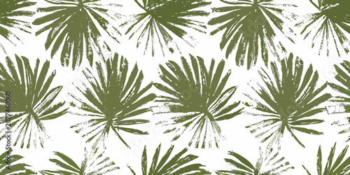 Tropical palm leaves seamless pattern in olive green tones