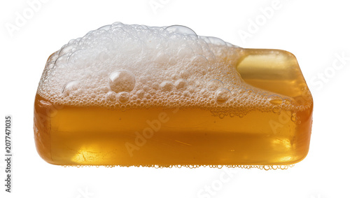 Obraz na płótnie Amber liquid soap bar with white foam bubbles