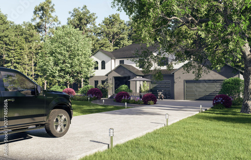 Modern two-story house with a large concrete driveway and pickup truck