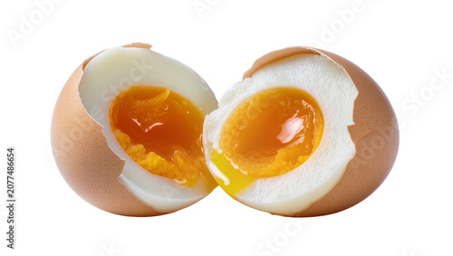 Fotografía Soft boiled egg cut in half showing runny yolk and white